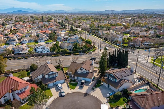 bird's eye view with a residential view and a mountain view