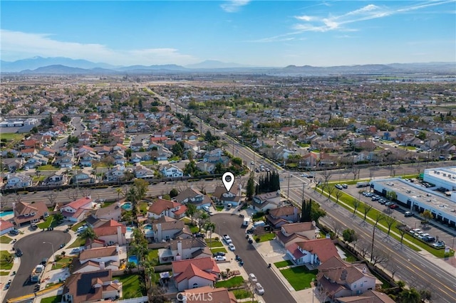 aerial view featuring a mountain view and a residential view