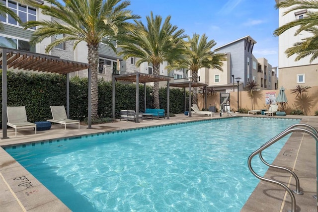 community pool featuring a patio and a pergola