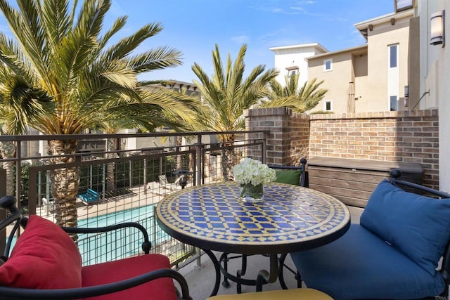 view of patio with a balcony