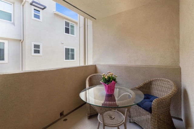 balcony featuring outdoor dining space