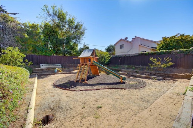 view of play area featuring a fenced backyard