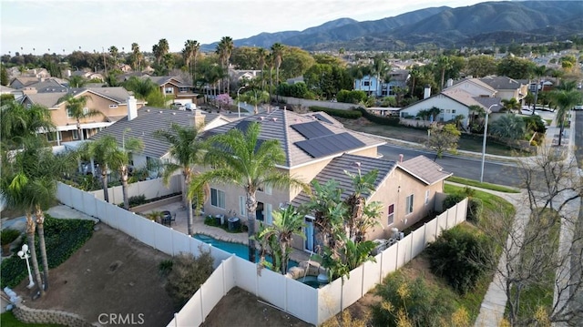 aerial view featuring a mountain view and a residential view