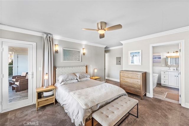 bedroom featuring connected bathroom, carpet flooring, baseboards, electric panel, and crown molding