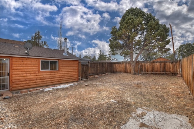 view of yard featuring a fenced backyard