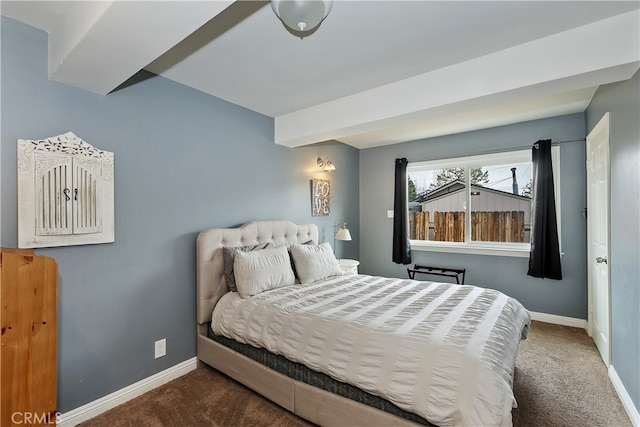 bedroom with baseboards and carpet flooring