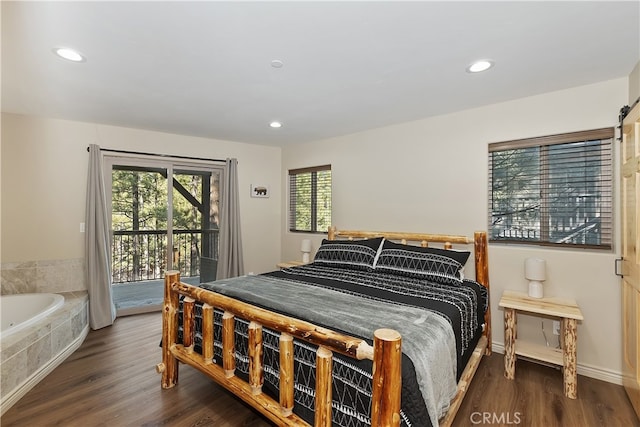 bedroom featuring baseboards, access to outside, wood finished floors, and recessed lighting