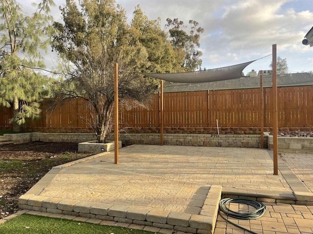 view of patio / terrace with a fenced backyard