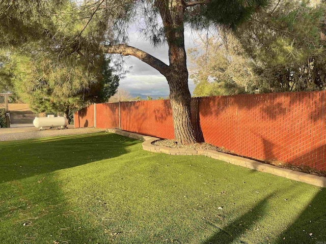 view of yard featuring fence