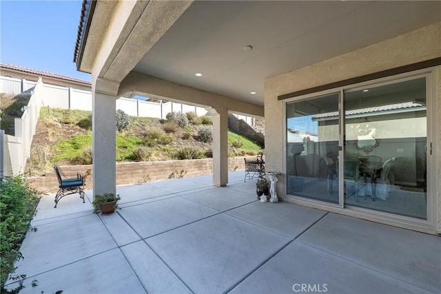 view of patio with fence