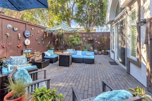 view of patio / terrace featuring a fenced backyard and outdoor lounge area