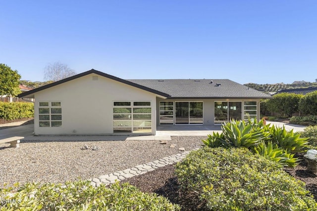 1037 Westridge Dr, Ventura, CA 93003 - rear view of property featuring stucco siding, a patio area, and a shingled roof