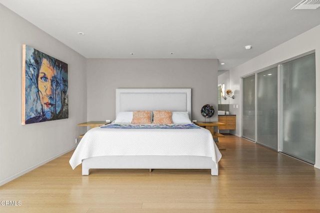 1037 Westridge Dr, Ventura, CA 93003 - bedroom featuring recessed lighting, wood finished floors, visible vents, a closet, and baseboards