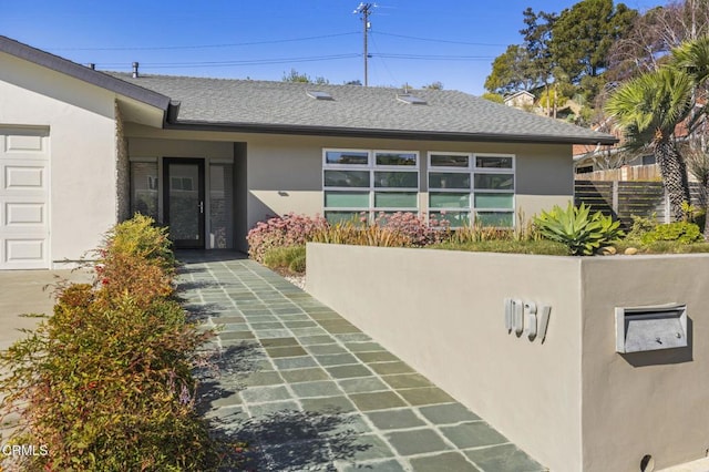 1037 Westridge Dr, Ventura, CA 93003 - entrance to property with fence, a shingled roof, and stucco siding