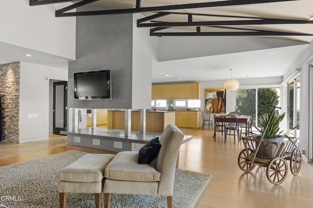 1037 Westridge Dr, Ventura, CA 93003 - living room with light wood-type flooring, high vaulted ceiling, recessed lighting, and beamed ceiling