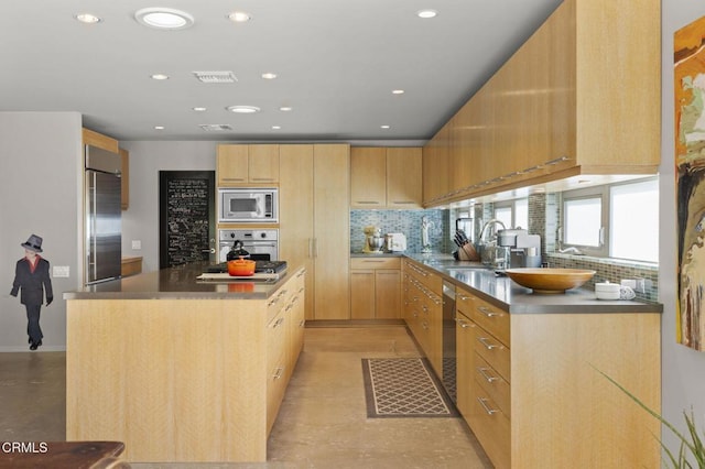 1037 Westridge Dr, Ventura, CA 93003 - kitchen featuring recessed lighting, stainless steel appliances, visible vents, light brown cabinets, and tasteful backsplash
