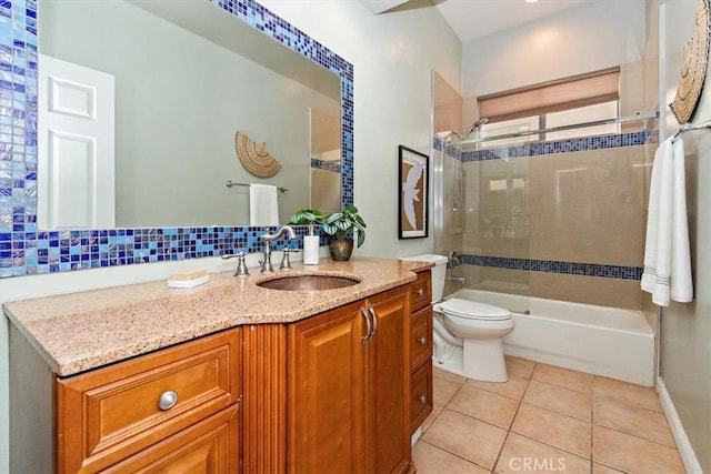 bathroom featuring shower / bathing tub combination, vanity, toilet, and tile patterned floors