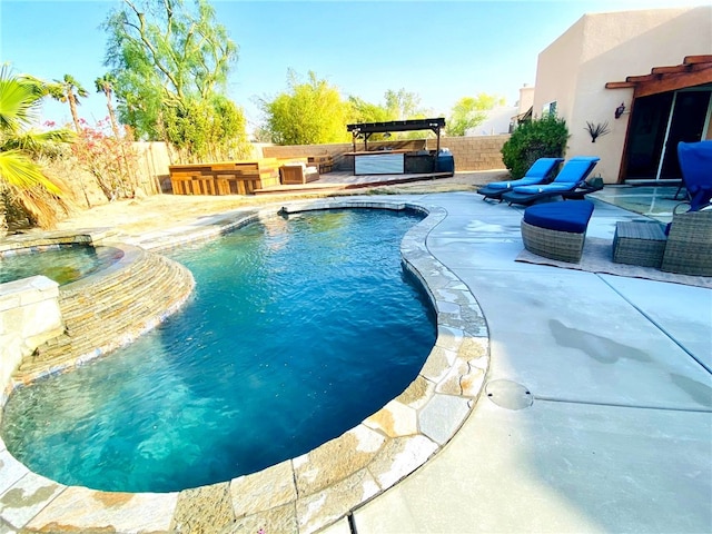 view of pool with a fenced backyard, an outdoor hangout area, an in ground hot tub, a fenced in pool, and a patio area