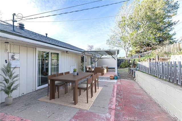 view of patio / terrace with outdoor dining area and a fenced backyard