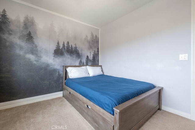 bedroom featuring baseboards and carpet flooring