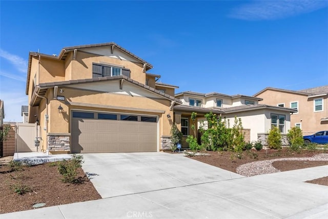32345 Jeter Ln, Menifee, CA 92584 - view of front of house with stone siding, concrete driveway, and stucco siding