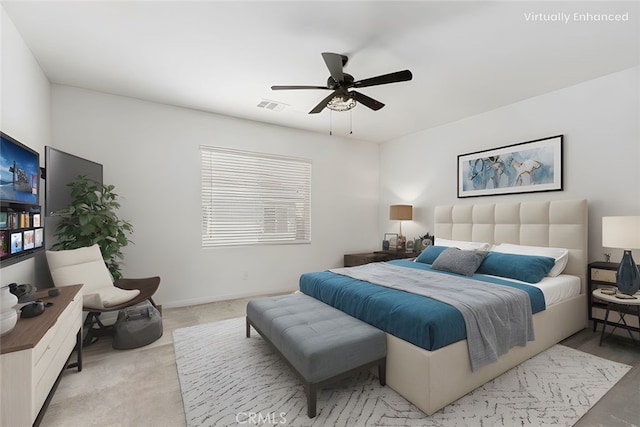 bedroom with a ceiling fan, visible vents, and baseboards