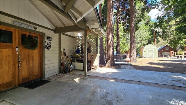 exterior space featuring an outbuilding and a storage shed