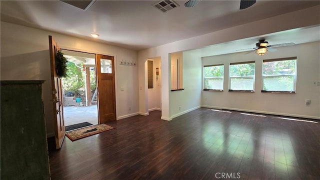 entryway with dark wood-style floors, visible vents, baseboards, and a ceiling fan