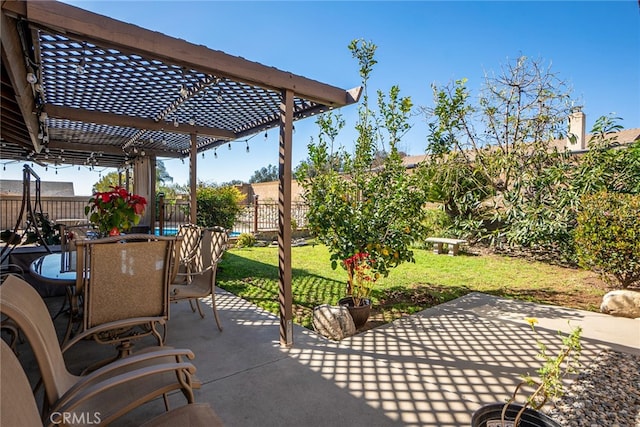 view of patio / terrace featuring outdoor dining area, fence, and a pergola