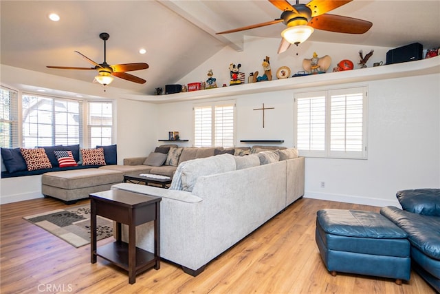 living room featuring baseboards, lofted ceiling with beams, ceiling fan, light wood-style floors, and recessed lighting