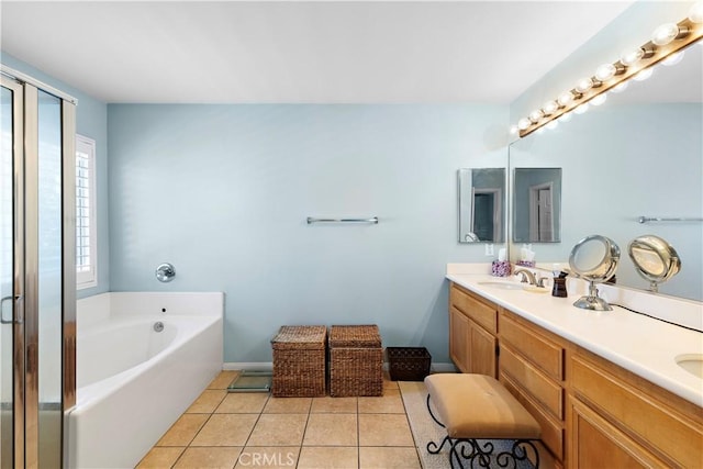 full bathroom featuring double vanity, a garden tub, tile patterned flooring, an enclosed shower, and a sink