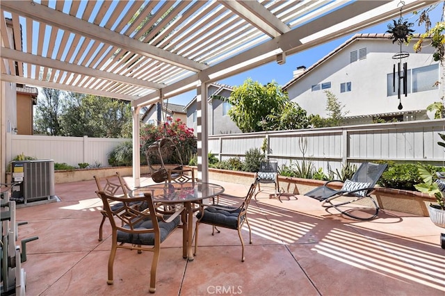 view of patio with outdoor dining space, a fenced backyard, cooling unit, and a pergola