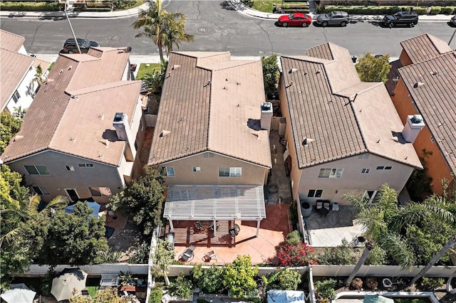 birds eye view of property with a residential view