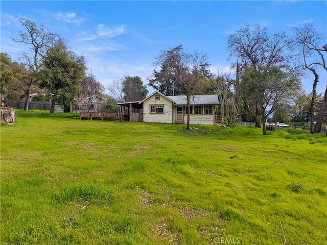 view of yard featuring fence