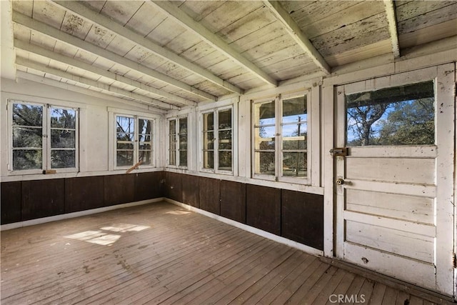 unfurnished sunroom with vaulted ceiling and wooden ceiling