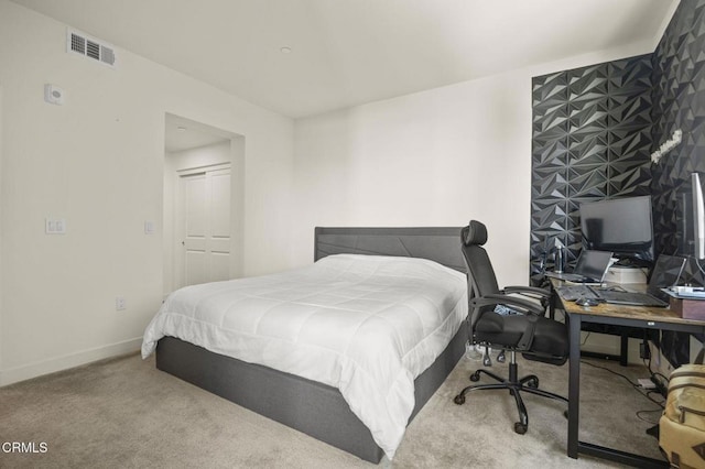 bedroom featuring visible vents, baseboards, and carpet flooring