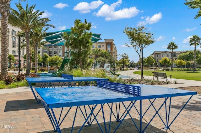 view of home's community featuring a patio