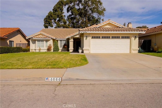 mediterranean / spanish-style house featuring a garage, a tile roof, a front lawn, and stucco siding