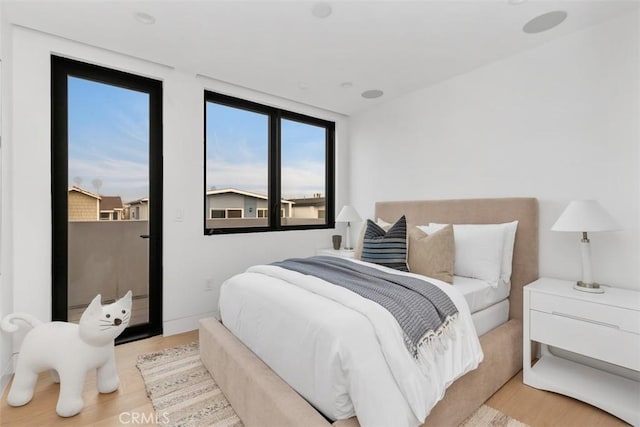 bedroom with wood finished floors