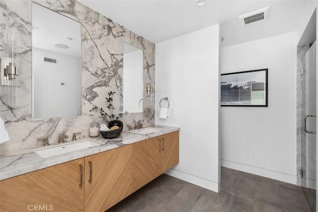 bathroom featuring double vanity, a sink, visible vents, and decorative backsplash