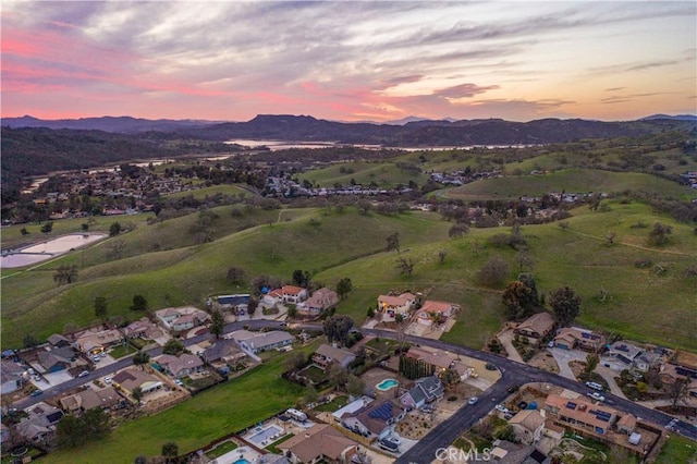 bird's eye view with a residential view and a mountain view