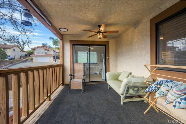 balcony with a ceiling fan