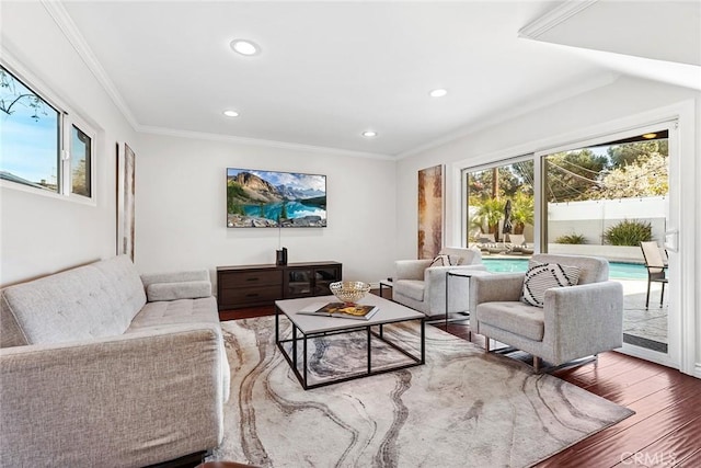 living room with recessed lighting, wood finished floors, and crown molding