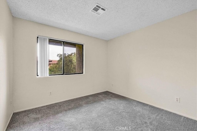 31200 Landau Blvd Unit 1404, Cathedral City, CA 92234 - carpeted spare room with a textured ceiling