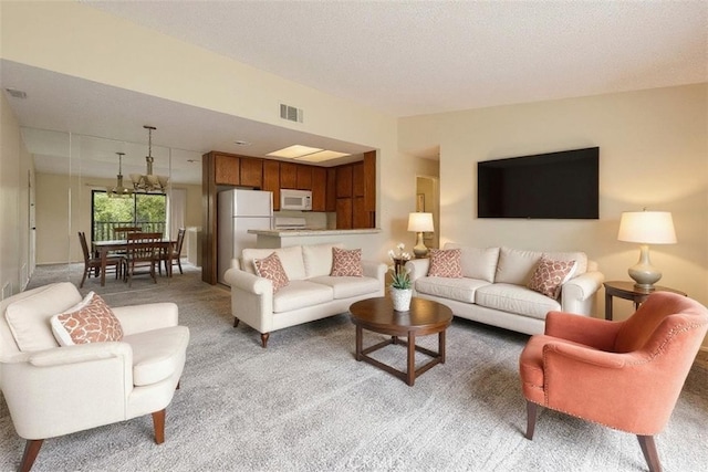 31200 Landau Blvd Unit 1404, Cathedral City, CA 92234 - living room featuring light colored carpet