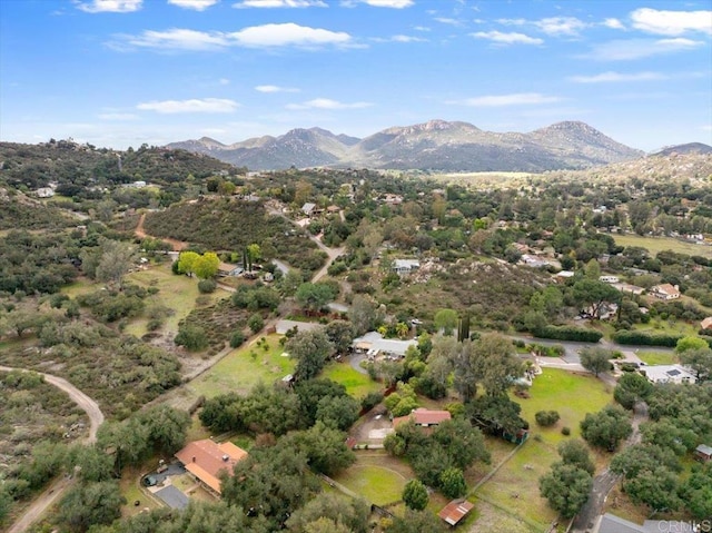 drone / aerial view featuring a mountain view