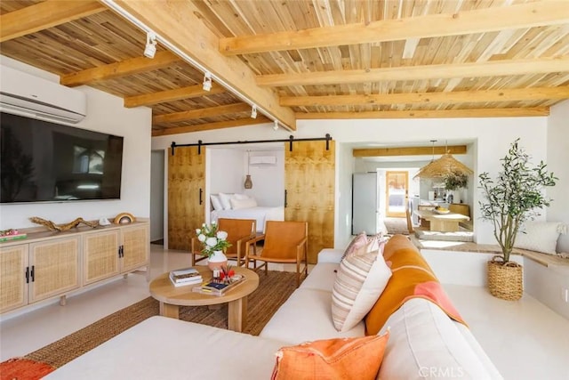 living room with vaulted ceiling with beams, a barn door, wooden ceiling, a wall mounted AC, and rail lighting