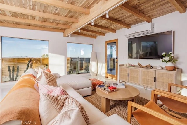 living room with a wall mounted AC, wooden ceiling, rail lighting, and beam ceiling