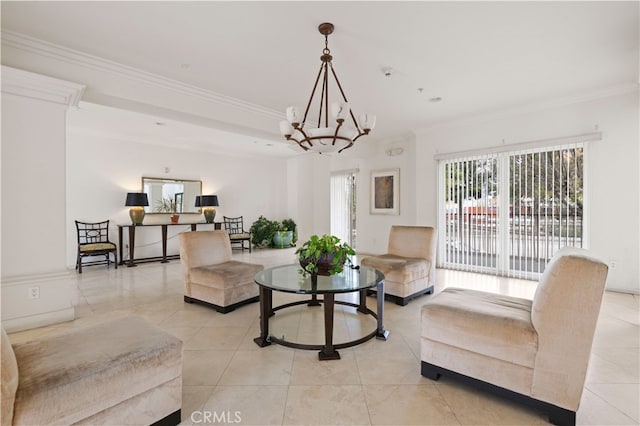 living area with light tile patterned floors, a chandelier, and ornamental molding