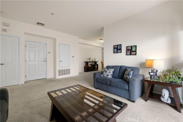 living room with light colored carpet and visible vents